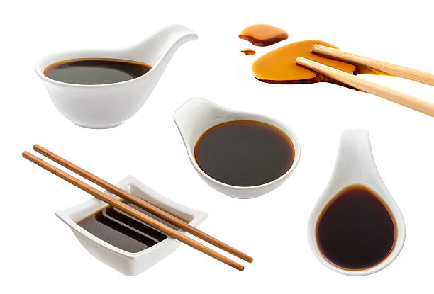 Soy sauce isolated on white Bowl with soy sauce isolated on white background soy sauce photos stock pictures, royalty-free photos & images