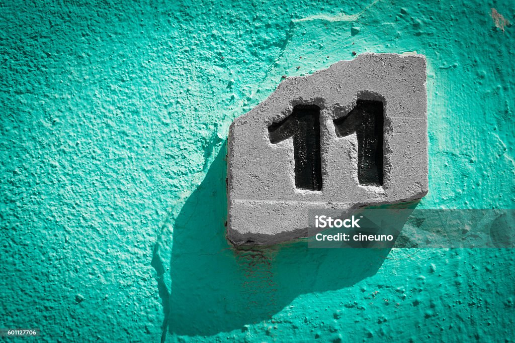 11,eleven number eleven engraved on a stone Number Stock Photo