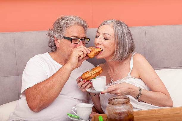 istock pretty mature couple having fun in the bed 601128686