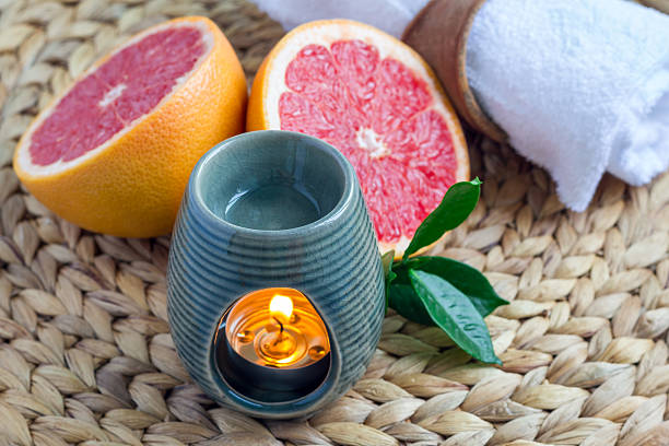 istock Aroma lamp with grapefruit essential oil, spa background, horizontal 601129218