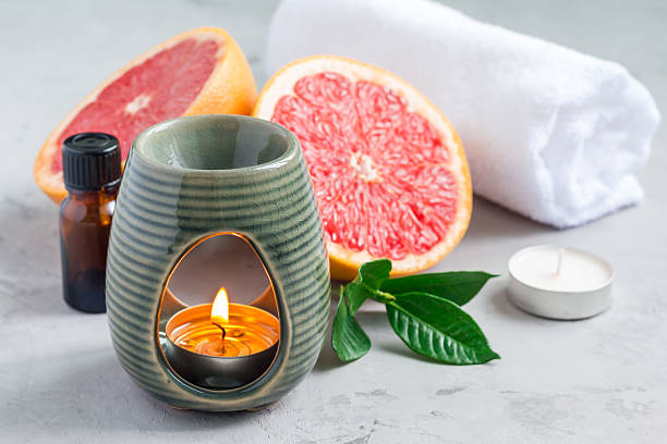 istock Aroma lamp with grapefruit essential oil, spa background, horizontal 601129314