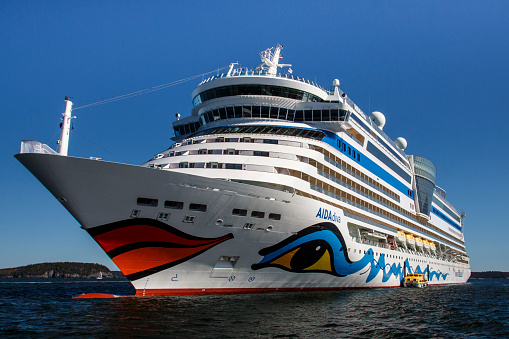 Bar Harbor, USA - October 15, 2015: The cruise ship AIDA Diva with it's characteristic logo of lips and eyes on both sides of the ship in the bay of Bar Harbor (Maine, USA)