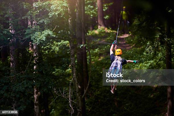 Fun Adrenaline And Adventure On The Zip Line Stock Photo - Download Image Now - Zip Line, Tyrolean Traverse, Women