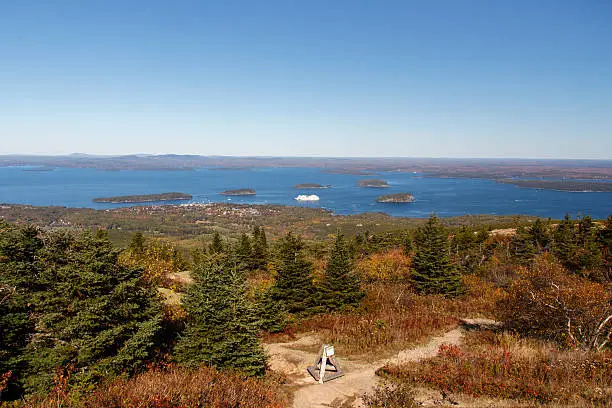 The natural beauty of the Acadia National Park in Bar Harbor (Maine, USA) from the Cadillac Mountain during the indian summer with changing foliage of fall
