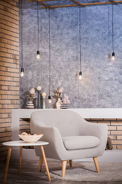 istock Interior of loft style: modern fireplace with firewood 601135672