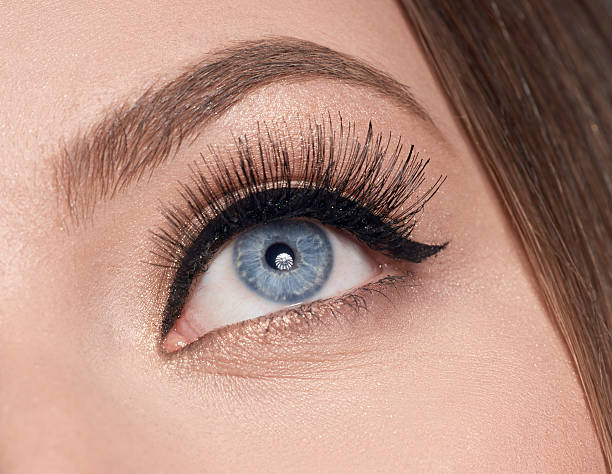 istock macro of blue eye looking up 601136158