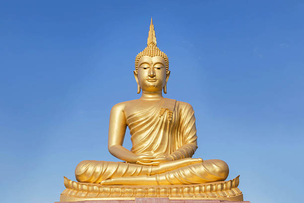 istock big golden buddha statue sitting on blue sky background 601139784