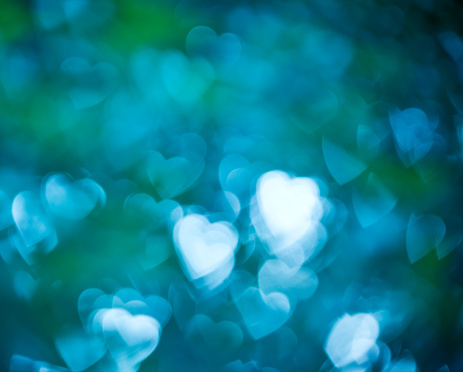 Abstract heart background, blurry defocused pattern .