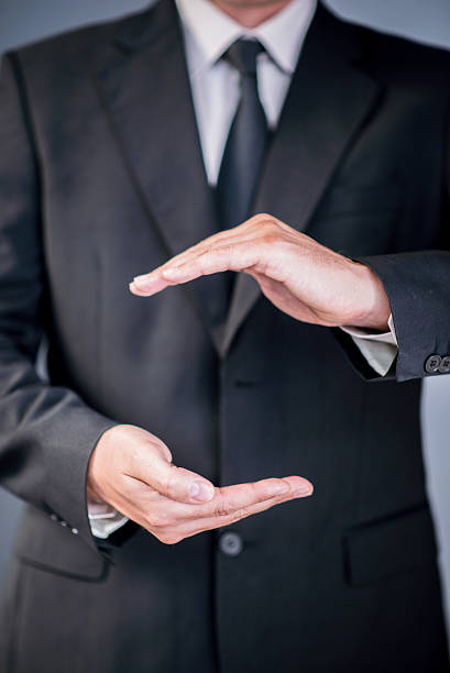 istock Close up of businessman holding for copy space 601140708