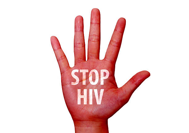 istock stop hiv written on woman hand 601142196