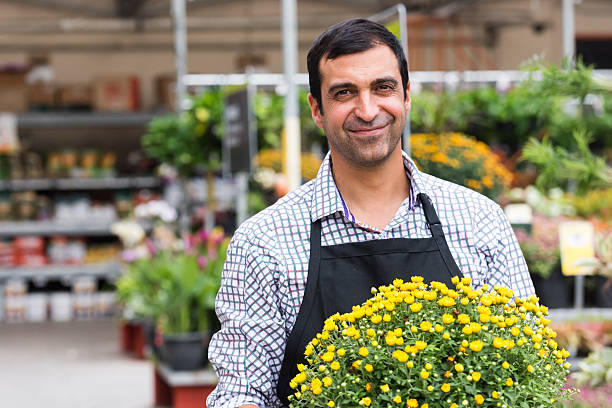 Male Florist working at a nursery