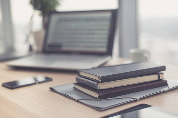 istock Office workplace with laptop and on wood table. 601143382