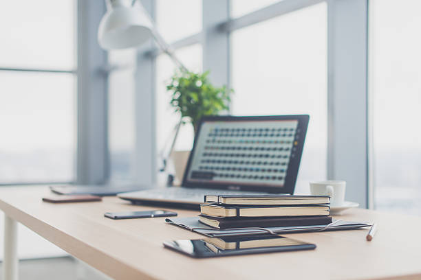 istock Office workplace with laptop and on wood table. 601143510