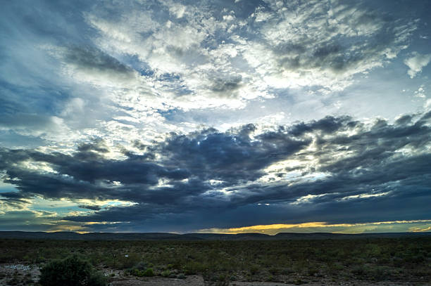 istock Sunset over landscape with clouds in New Mexico 601145478