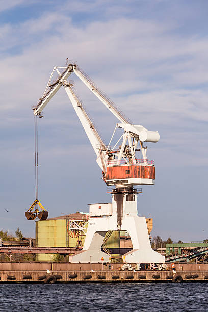 istock Working crane unload cargo in a Swedish seaport 601145632