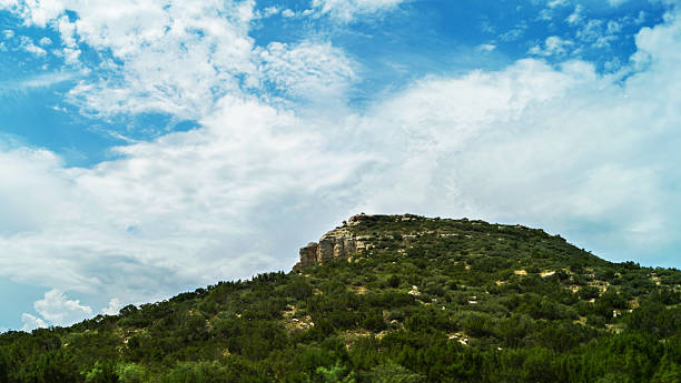 istock landscape with hill, rocks and clouds in western Texas 601146334