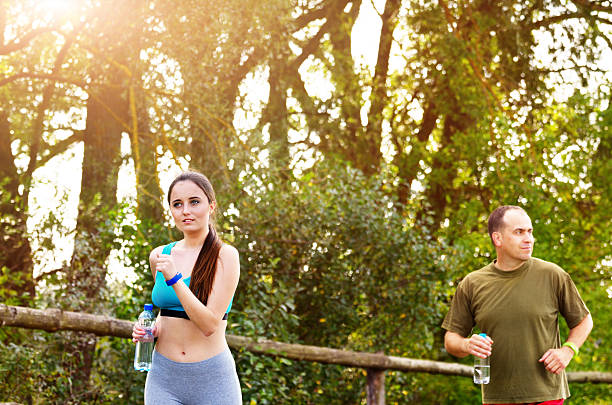 istock Couple running outdoors 601146638