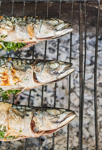 istock Mackerel fish prepared on the grill in smoke 601146688