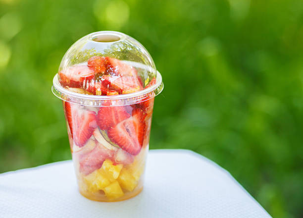 frutas en rodajas en taza - fruit cup fotografías e imágenes de stock