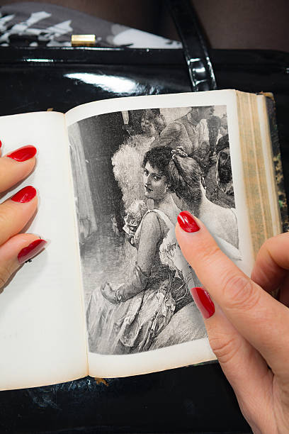 Woman points at a vintage woman visiting a ball