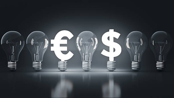 istock Luminous euros - dollar sign with light bulbs. rendering 3D 601152542