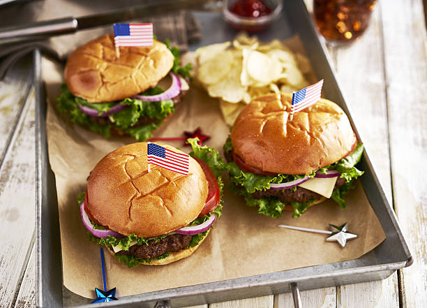 patriotic american cheese burges with flags on tray