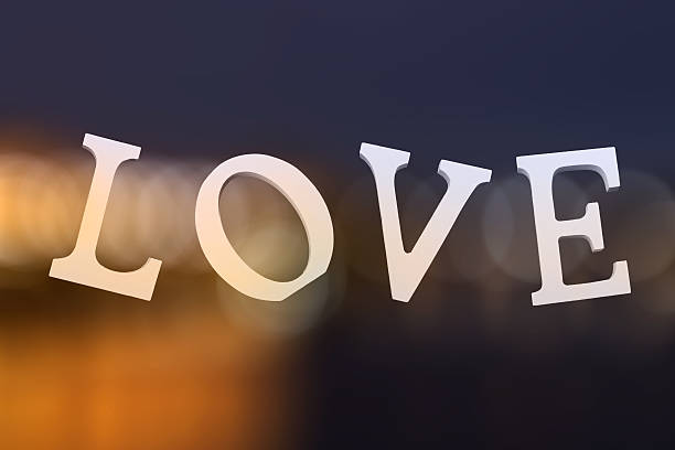 istock Flying love letters on modern abstract blurred background 601155926