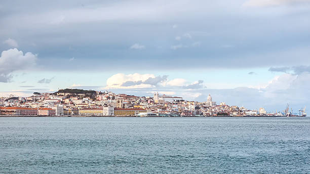 Panorama of Lisbon, Portugal View of Lisbon, Portugal, with Atlantic Ocean in the foreground gegenüber stock pictures, royalty-free photos & images