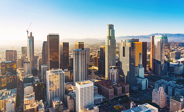 aerial view of a downtown la at sunset - city stockfoto's en -beelden