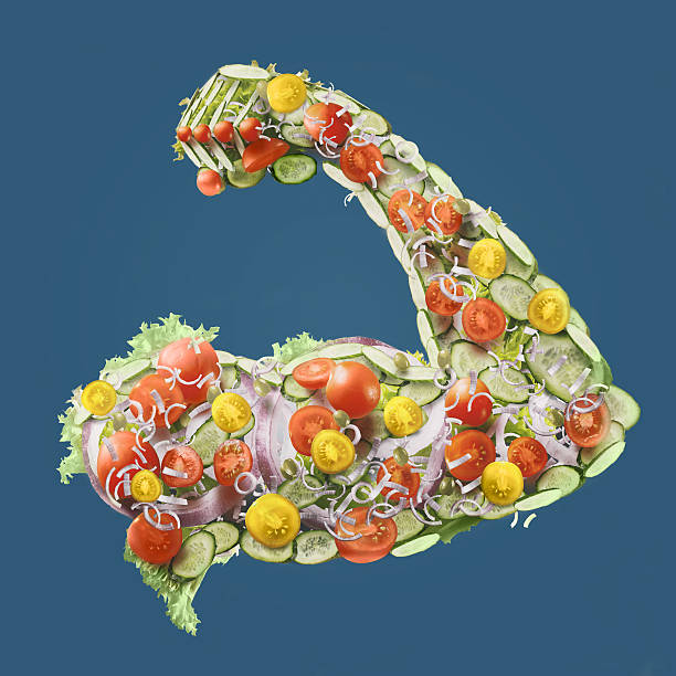 power fresh salad Power fresh salad. Vegetables with big muscular man hand in blue background eating body building muscular build vegetable stock pictures, royalty-free photos & images