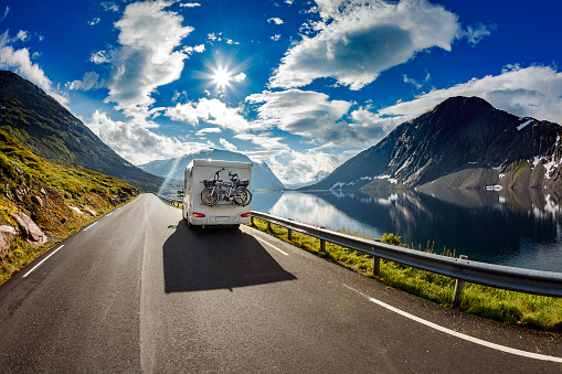 Caravan car travels on the highway.