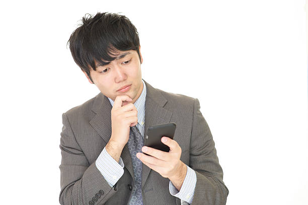 istock Uneasy Asian Businessman 601358894