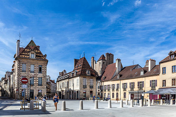 half timbered  houses at Place Cordeliers in Dijon, Burgundy Dijon, France - September 3, 2016: people visit half timbered  houses at Place Cordeliers in Dijon, Burgundy, France. The place is named after the old franciscan monastery at turgot street. dijon stock pictures, royalty-free photos & images