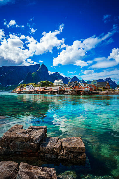 Lofoten islands is an archipelago in the county of Nordland, Norway. Is known for a distinctive scenery with dramatic mountains and peaks, open sea and sheltered bays, beaches and untouched lands.