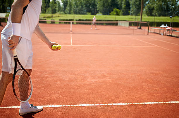 istock Preparing to serve tennis ball 601359620