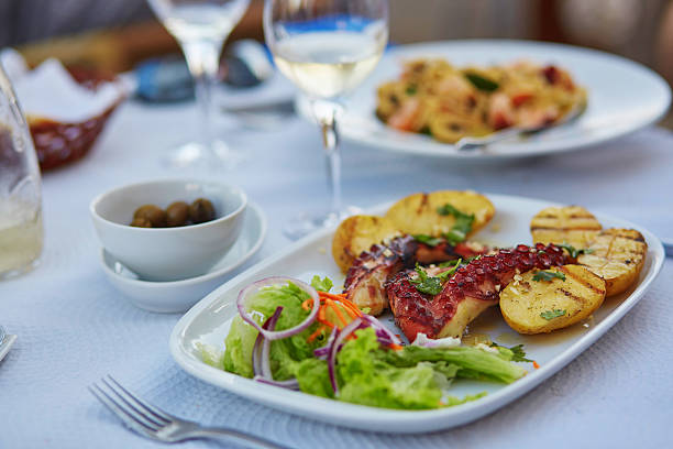 istock Grilled octopus with baked potatoes 601359984