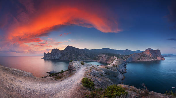 istock Beautiful panoramic landscape with mountains, sea at sunset 601362292