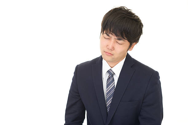istock Tired Asian businessman 601364294