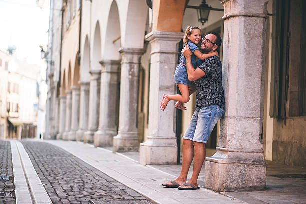 istock Father Holding His Daughter 601364868