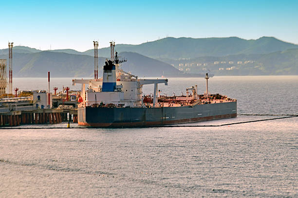 istock loading chemical tankers in the port 601365272