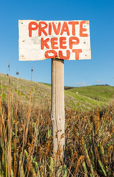 istock Private Keep Out warning sign in rural remote area 601365520