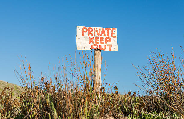 istock Private Keep Out warning sign in rural remote area 601365540