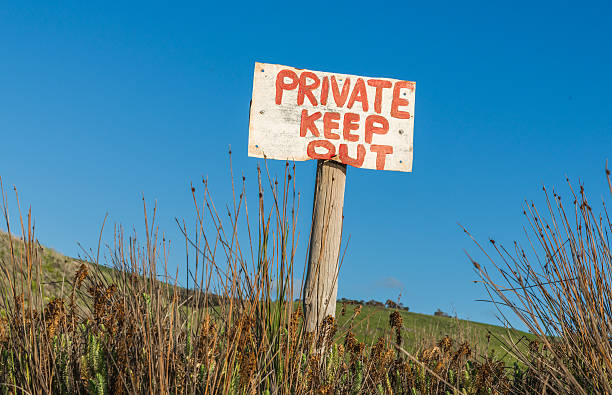 istock Private Keep Out warning sign in rural remote area 601365564