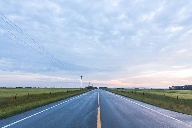 istock Paved  Road in the Prairie 601366442