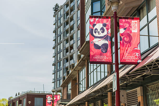 Vancouver, Canada - April 19, 2016: Chinatown in downtown with banner and panda culture symbol with text of since 1885 