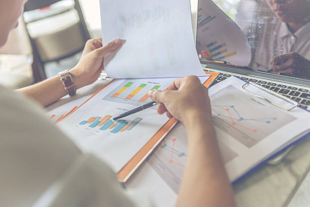istock The man reading and analysing data in the sales chart 601368128