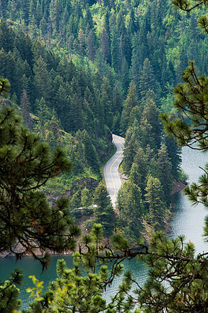 istock View of road in forest by lake from mountain 601368982