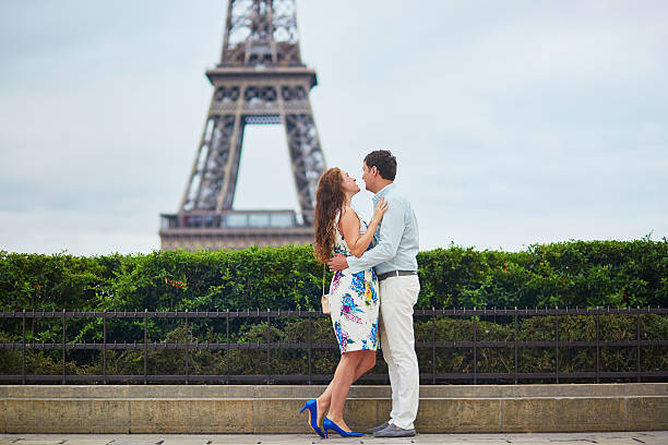 istock Romantic loving couple having a date near the Eiffel tower 601370134