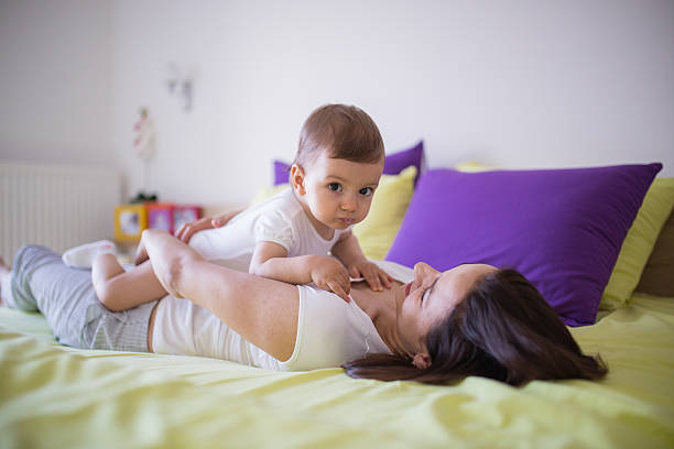istock Mother and baby in bedroom 601372114
