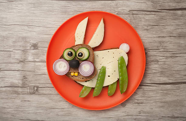 istock Funny rabbit made of bread and vegetables 601372746